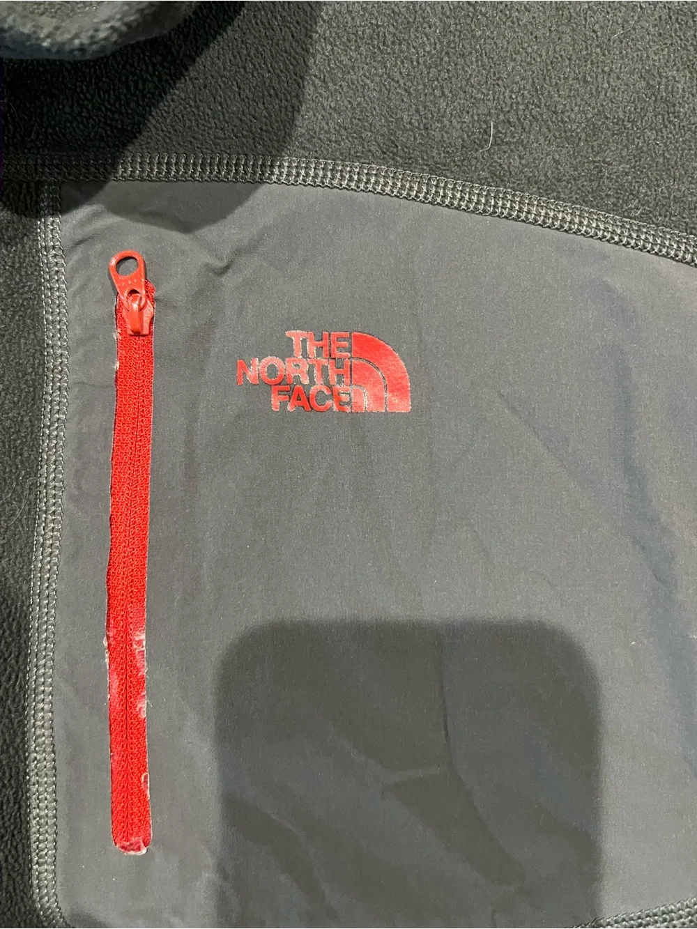 used The North Face Men's Dark Gray Fleece Pullover with Chest Pocket